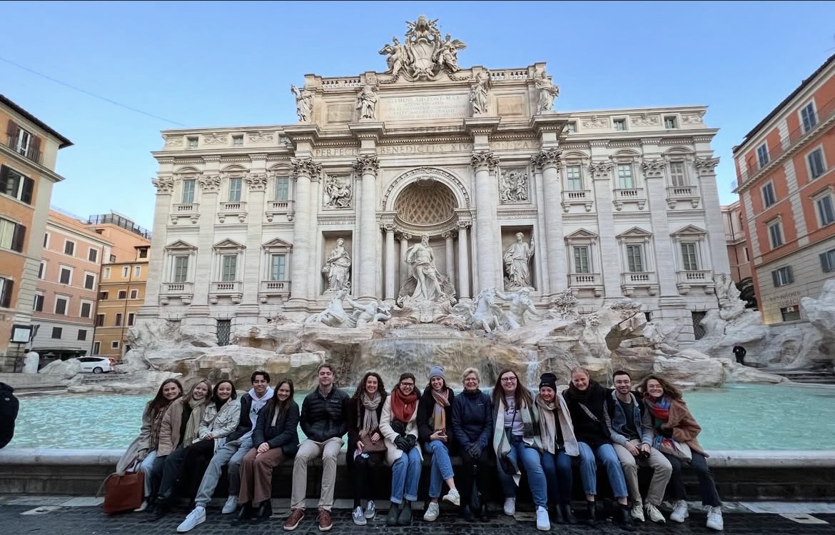  Students pose in front of the Trevi Fountain in Rome, Italy